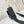 GETAWAY MESSENGER 18 IN BLACK EMBOSSED CALFSKIN