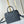 SPEEDY BANDOULIÈRE 25 WITH CRISS CROSS PATTERN IN BLACK LAMBSKIN