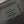 MESSENGER VOYAGER PM 33 IN GUN METAL MONOGRAM ECLIPSE CANVAS