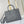 ONTHEGO PM 25 IN GUN METAL EMBOSSED CALFSKIN