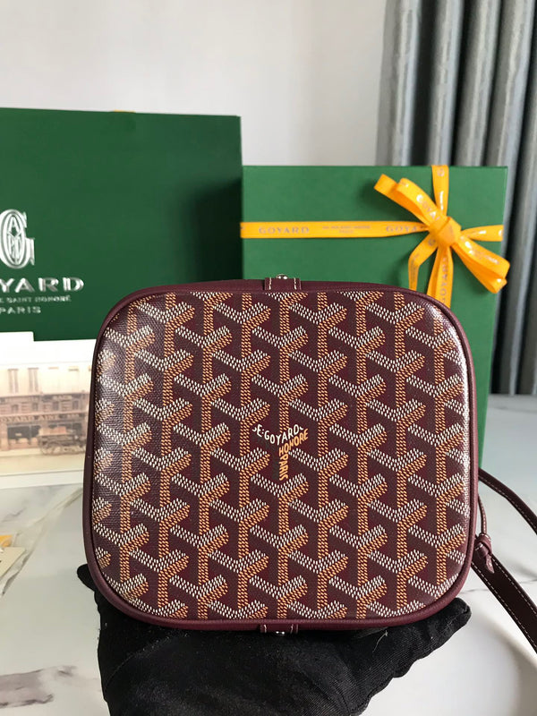 PETIT FLOT BUCKET BAG 22 IN WINE RED GOYARDINE CANVAS AND LAMBSKIN TRIM