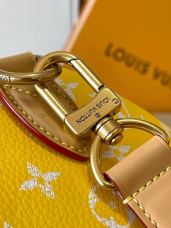 speedy p9 bandouliere 25cm yellow calfskin