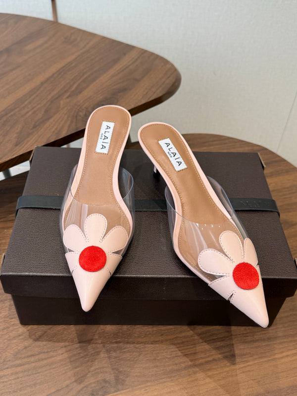 Alaia Daisy Mules 55mm Cowhide Clear PVC 889945