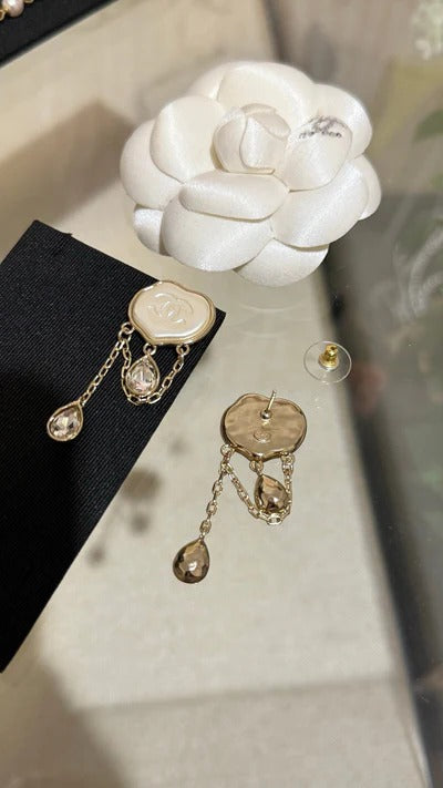 Chanel Cloud Double C Resin Double Teardrop Crystal Light Gold Chain Tassel Earrings