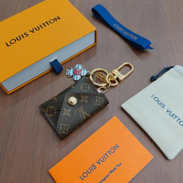 LV Brown Bag Charm With Blue Flower