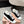 Miu 25 Small Bow Sneaker Black White Suede Wool 541919