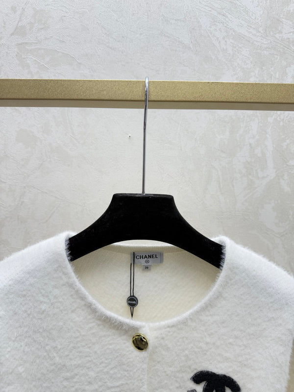 Chanel 2025 Cardigan White and Black Wool Faux Fur Trim