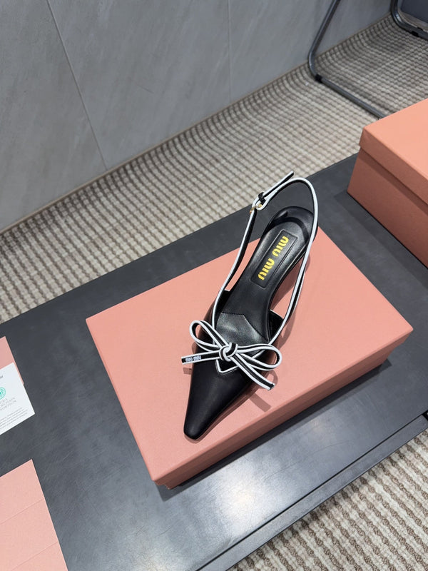 Miu 26s Slingback 55mm In Black White Calfskin With Bow