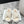 CROSS STRAP SLIPPER IN WHITE SHEARLING