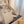 LOE 23 COMPACT HAMMOCK BAG IN SAND SATIN CALFSKIN