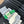 WOVEN SLIDE IN RAFFIA AND EMERALD GREEN LAMBSKIN
