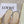 PETAL BELT FLAT SANDAL IN BEIGE CREAM CALFSKIN