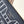 NEVERFULL BANDOULIÈRE INSIDE OUT BB 24 IN BROWN MONOGRAM CANVAS AND BLACK CALFSKIN