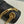 MEDIUM VICTOIRE BAG 25 IN BLACK TRIOMPHE CANVAS GOLD HARDWARE