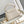 CAPUCINES MINI 21 IN PEARL WHITE TAURILLON GOLD HARDWARE
