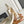 CAPUCINES MINI 21 IN PEARL WHITE TAURILLON GOLD HARDWARE