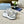 PRA BLACK THICK SOLE SNEAKER GRAY AND WHITE CALFSKIN
