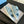 PRA RAFFIA CORK SLIDE SKY CALFSKIN