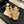 FLAT SANDALS IN PEANUT BROWN LAMBSKIN WITH GOLD CHAIN