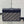 MONTAIGNE EAST-WEST 24 BAG WITH CHAIN IN NAVY BLUE LAMBSKIN AND MONOGRAM JACQUARD