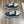 LV TRAINER SNEAKER IN BLACK MIX COBALT BLUE DENIM