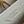 CAPUCINES BB 27 DARK BEIGE TAURILLON GOLD HARDWARE