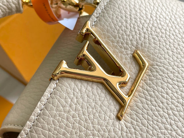 CAPUCINES BB 27 BEIGE TAURILLON GOLD HARDWARE