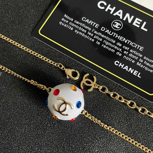 CC 26s Double C Logo White Enamel Crystal Ball Pendant Necklace In Gold Metal 629889