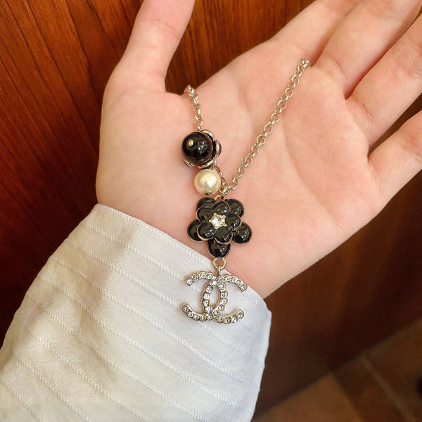 CC 26s Double C Logo Black Flower & Pearl Charm Pendant Necklace With Crystal Detail In Gold Metal 631012
