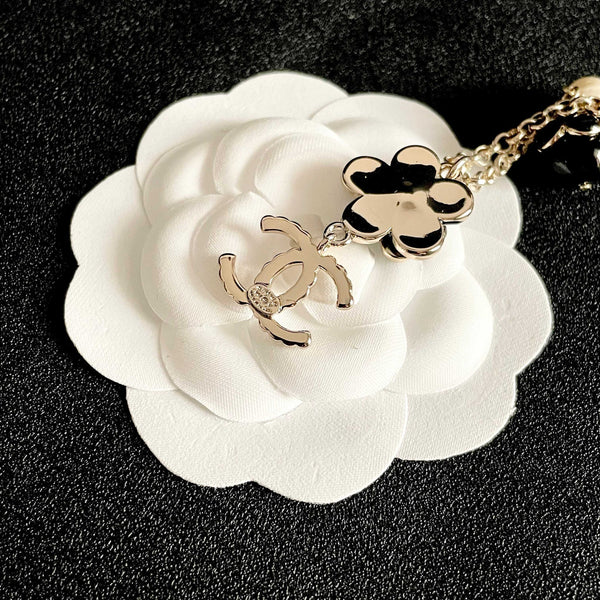 CC 26s Double C Logo Black Flower & Pearl Charm Pendant Necklace With Crystal Detail In Gold Metal 631012