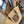 LOE SMALL ANAGRAM BASKET 28 BAG IN NATURAL MIX BROWN IRACA PALM AND CALFSKIN