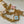 capucines bb 27 beige cloud blue taurillon leather gold hardware