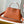 CAPUCINES SOUPLE GM 38 IN COGNAC CALFSKIN GOLD HARDWARE