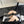 cross puffy slippers beige black lycra fabric