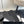 cross puffy slipper black lycra fabric
