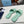PRA SAFFIANO PATENT SLIDES OSTRICH MOTIF SEAFOAM CALFSKIN