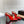 ALAIA AZZEDINE HIGH HEELS IN CHERRY RED CALFSKIN WITH GOLD HARDWARE