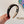 BLACK FABRIC HAIRBAND WITH GOLD LOGO 414437