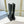 KNEE BOOTS WITH TRIANGLE LOGO IN BLACK CALFSKIN