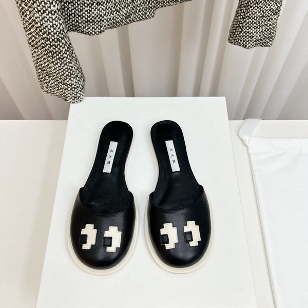The Row Semi Slippers Black Sheepskin 827492