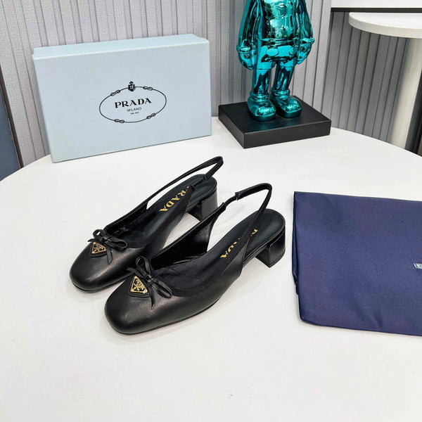 Prad 26s Round Toe Slingback Pumps 40mm In Black Calfskin With Bow