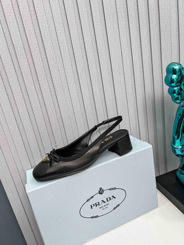 Prad 26s Round Toe Slingback Pumps 40mm In Black Calfskin With Bow