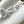 CAPUCINES EAST-WEST MINI 21 IN WHITE TAURILLON