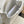 CAPUCINES EAST-WEST MINI 21 IN WHITE TAURILLON