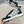 LV TRAINERS IN BLACK CALFSKIN AND WHITE JACQUARD