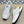LV TRAINERS IN WHITE CALFSKIN AND JACQUARD