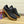 LV TRAINERS IN BLACK CALFSKIN AND BROWN RUBBER