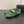ALAIA BALLET FLATS IN COOL GREEN MESH FISHNET WITH GOLD HARDWARE