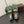 ALAIA BALLET FLATS IN COOL GREEN MESH FISHNET WITH GOLD HARDWARE