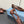 CUT-OUT BALLERINA FLAT IN CHOCOLATE BROWN SATIN ATTACHED BEAD BUCKLE